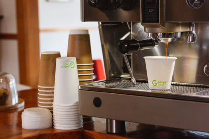 Disposable Single Wall Coffee Cup being Filled at a Cafe