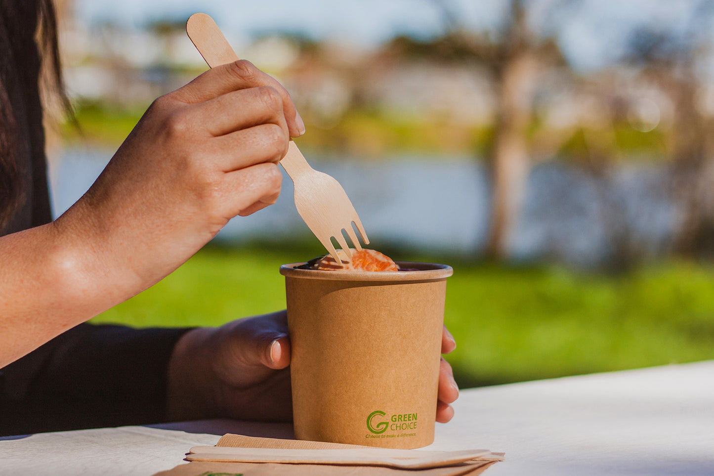 Using a Wooden Fork to Eat a Salad from a Disposable Kraft Soup Bowl