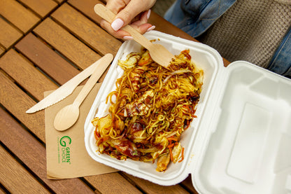 asian cuisine being eaten from a Sugarcane Takeaway Container